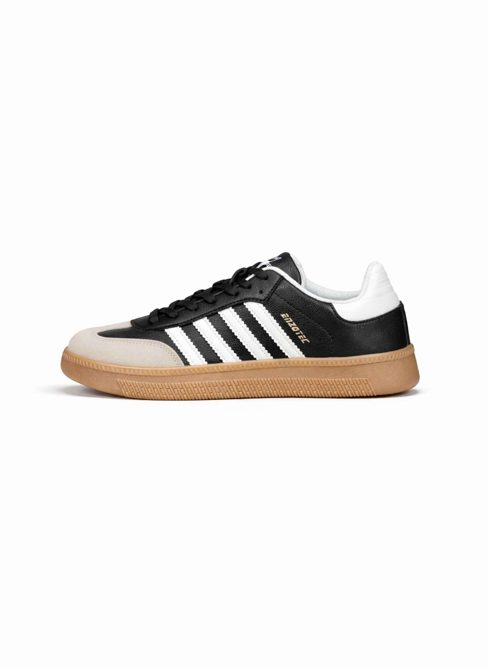 Tenis de hombre casual con diseño negro y blanco, ideal para uso diario y estilo moderno.