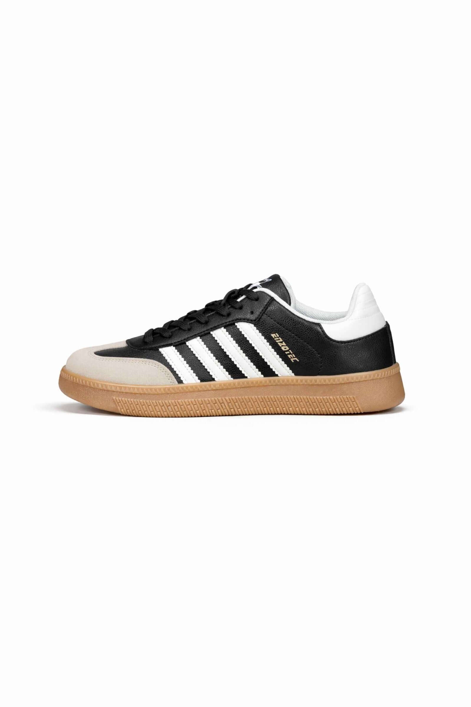 Tenis de hombre casual con diseño negro y blanco, ideal para uso diario y estilo moderno.