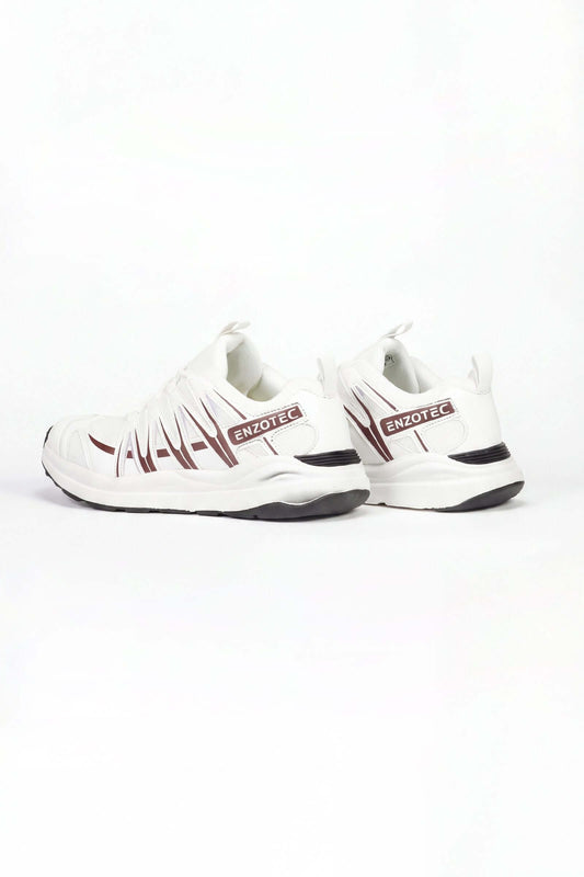 Tenis de hombre deportivo en color blanco y detalles en rojo, diseñados para un estilo activo y cómodo.